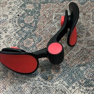 Black and Red resistance thigh master